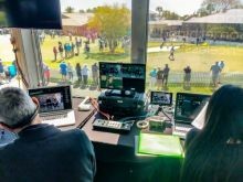 View of practice green from our producer's workstation at a golf tournament.